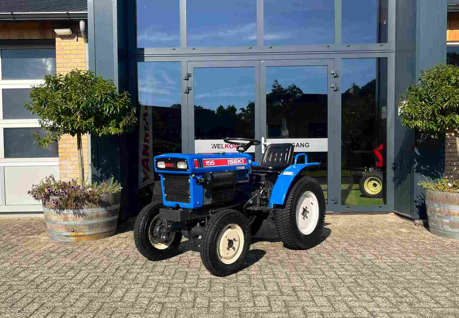 marge Iseki TX 155 met gazonbanden
